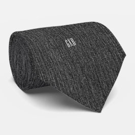 Corbata de seda negra con monograma moderno en un