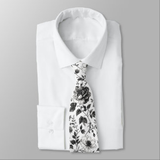 Corbata elegante con patrón floral en blanco y neg