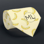 Corbata Graciosa Novedad de Monograma de Ilustracion de pl<br><div class="desc">Este divertido y frugal patrón bananero amarillo fue creado usando mi ilustracion de plátano de medios mixtos pintado a mano y hace un peculiar diseño de novedad para aquellos que no toman la vida, ¡o sus medias demasiado en serio! El tono mullido del diseño de tono le da un toque...</div>