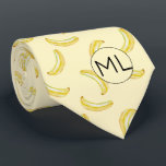 Corbata Graciosa Novedad de Monograma de Ilustracion de pl<br><div class="desc">Este divertido y frugal patrón bananero amarillo fue creado usando mi ilustracion de plátano de medios mixtos pintado a mano y hace un peculiar diseño de novedad para aquellos que no toman la vida, ¡o sus medias demasiado en serio! El tono mullido del diseño de tono le da un toque...</div>