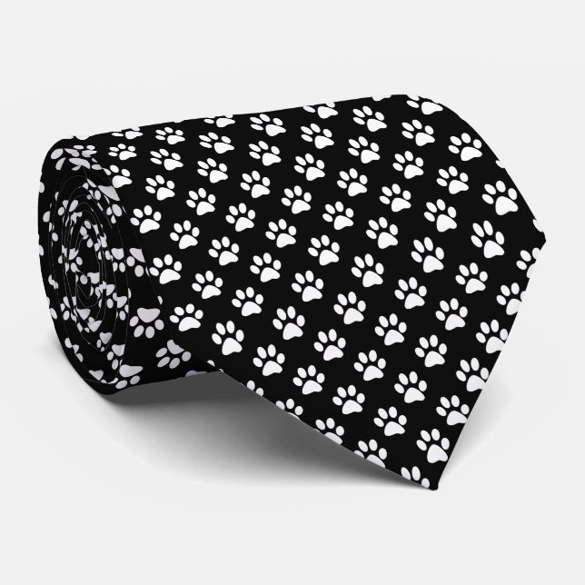 Corbata Huellas de pata blancas sobre negro (Enrollado)