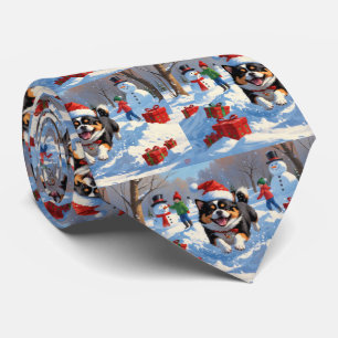 Corbata Japanese Chin corriendo en la nieve con sombrero d