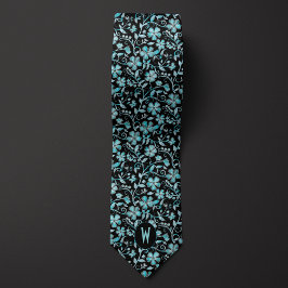 Corbata negra con flores azul verde