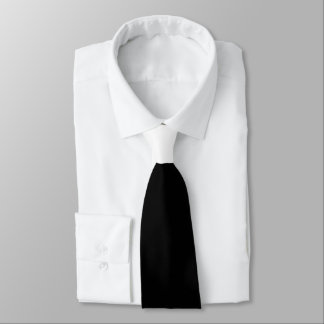 Corbata Negro con el contraste blanco del nudo