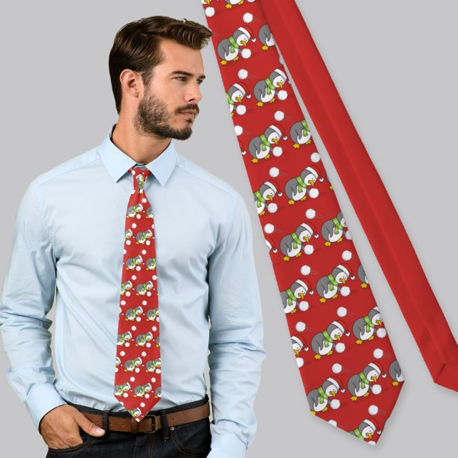 Corbata pingüino de Navidad cogiendo una bola de nieve (Subido por el creador)