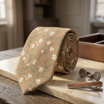 Corbata Tan Wildflower Delicate White Blossom & Leaves<br><div class="desc">Bring gentle, timeless romance to your wardrobe with this exquisite tan necktie blooming with delicate wildflowers! A graceful scatter of petite white blossoms, soft green leaves, slender stems, and subtle foliage creates a light, airy botanical pattern across a warm, earthy beige-tan background, evoking peaceful meadows and vintage pressed-flower elegance. This...</div>