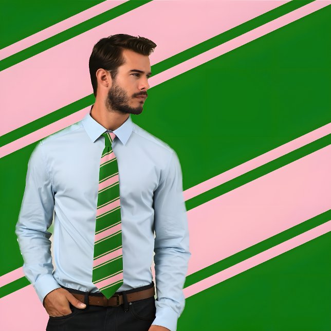 Corbata Tira diagonal rosa y verde gruesa y delgada (Man wearing Pink & Green Thick and Thin Diagonal Stripes Tie. He stands against patterned background)
