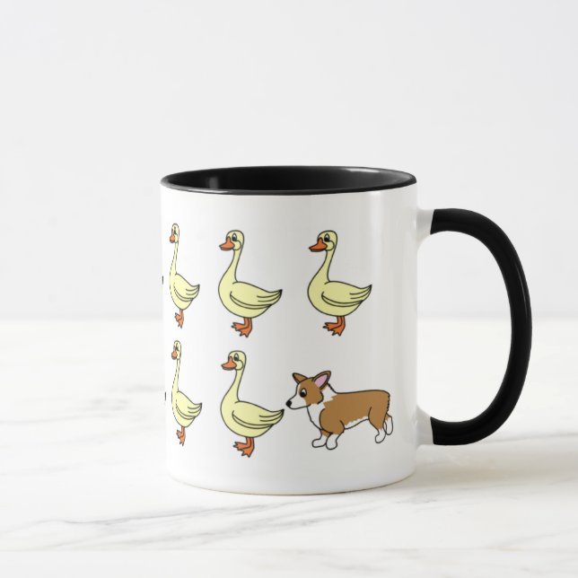 Corgi Galés del Pembroke que reúne la taza de los (Derecha)