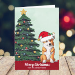 Corgi Personalizado lindo en el árbol de Navidad d<br><div class="desc">Este hermoso perro de Pembroke Welsh Corgi tiene la cabeza inclinada dentro de un lindo gorra de Santa Claus. El cachorro está sentado frente a un árbol de Navidad bonito decorado con adornos coloridos. Feliz Navidad está escrito en la parte delantera con una bonita cursiva en esta tarjeta de vacaciones...</div>