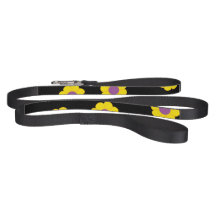 Mascota negro con flores amarillas y moradas