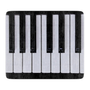 Cortar El piano blanco y negro cierra a la tabla de