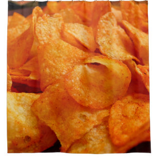 Cortina De Ducha Close up of juicy, crispy, chips on black plate.