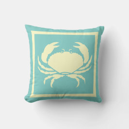 CRAB, blanco roto sobre la almohada azul