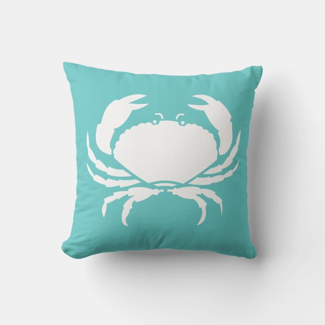CRABS BLANCO sobre almohada azul verde azulada (Anverso)