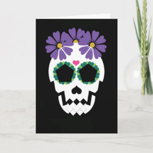 Cráneo con tarjeta de saludo de flores moradas