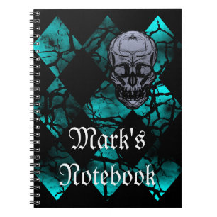 Cráneo y cuaderno góticos impresionantes del