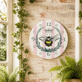 Crown Bee | Reloj de pared rayado rosa y blanco