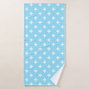 Cruces de polka blanco sobre azul bebé