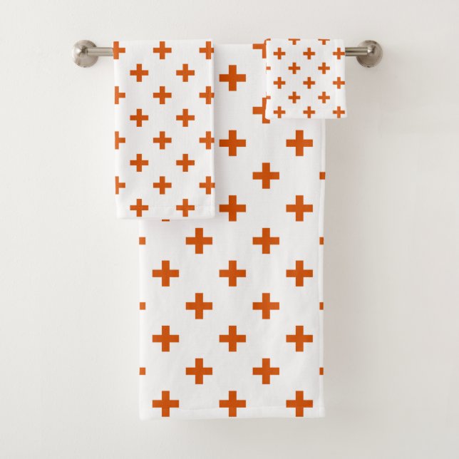 Cruces de polka naranja sobre blanco (In situ)