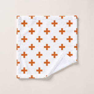 Cruces de polka naranja sobre blanco