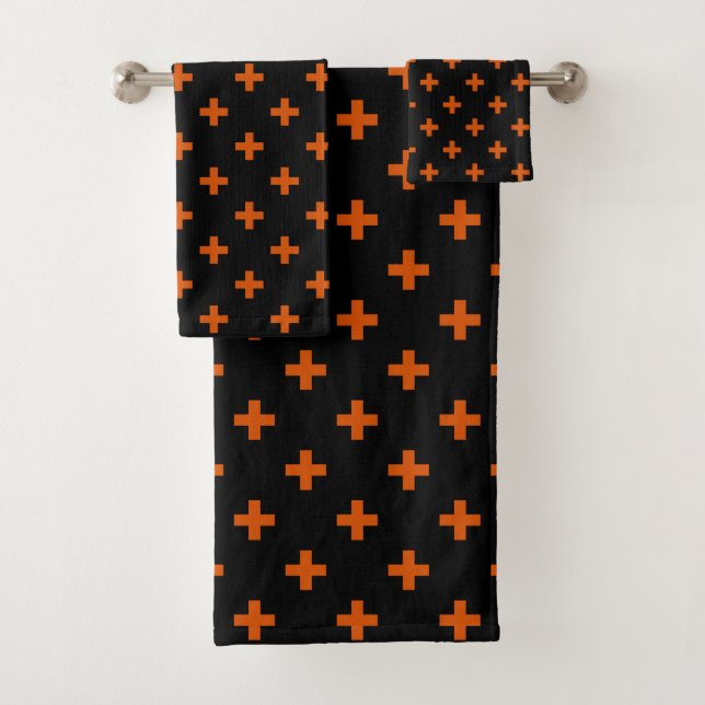 Cruces de polka naranja sobre negro (In situ)