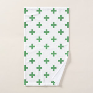 Cruces de polka verde sobre blanco