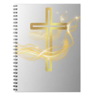 Cruz dorada radiante elegante en libreta de plata