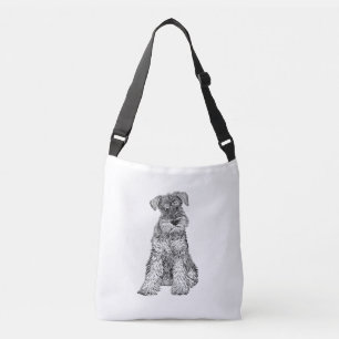 Cruzado El bolso del perro del Schnauzer, dobla echado a