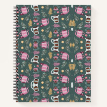 A spiral-bound notebook with a festive pattern