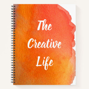 Cuaderno acuarela naranja la cita de la vida creativa
