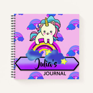 Cuaderno Adorable gato gatito unicornio sentado en un arcoi