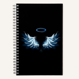 Cuaderno Alas del Ángel Azul brillante sobre fondo negro
