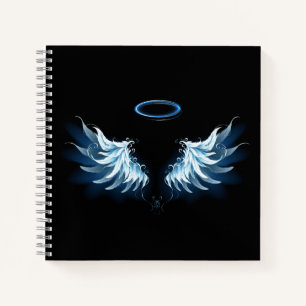 Cuaderno Alas del Ángel Azul brillante sobre fondo negro