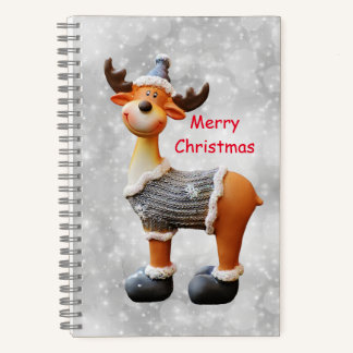 Cuaderno Alce de Navidad feliz que lleva un sombrero
