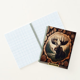 Cuaderno Alce majestuoso en un paisaje boscoso al amanecer