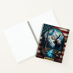 Cuaderno Alce majestuoso junto a un río sereno en las monta