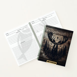 Cuaderno Alce majestuoso rodeado de naturaleza y estrellas