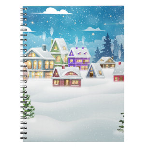 Cuaderno Aldea de invierno por la noche con cubierta de nie