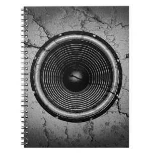 Cuaderno Altavoz musical en una pared rota