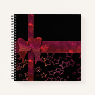 Cuaderno Arco rojo purpurina y estrellas en negro