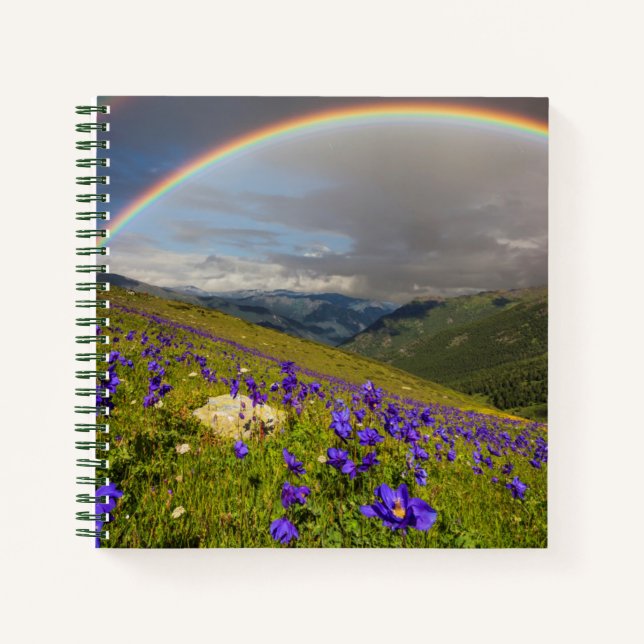 Cuaderno Arcoiris sobre un prado florido (Anverso)