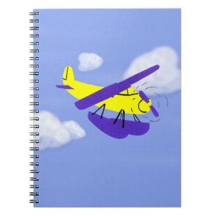 Cuaderno Arte de dibujos animados amarillo y azul de avión