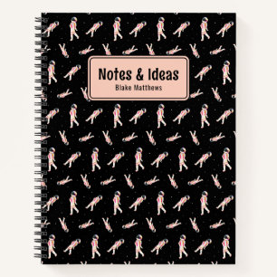 Cuaderno Astronautas de Guay flotando en equipo portátil Pe