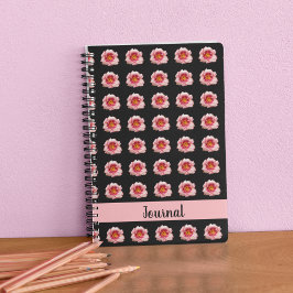 Cuaderno Auge diurno rosado sobre el patrón floral negro