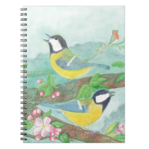 Cuaderno Aves cantando en una rama de árbol floreciente