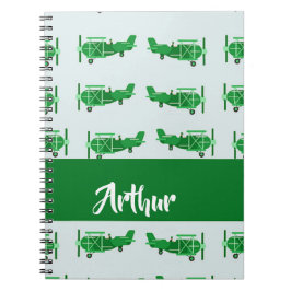 Cuaderno Aviones voladores verdes sobre azul