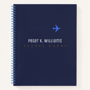 cuaderno azul de agente de viajes con avión