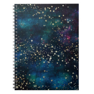 Cuaderno Azul y oro debajo del cielo nocturno de las