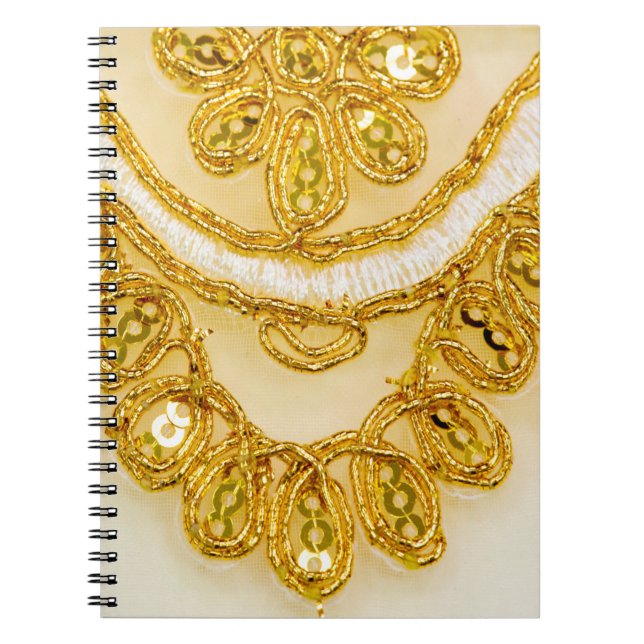 Cuaderno Banda dorada de encaje amarillo. Textura de fondo, (Frente)