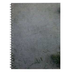 CUADERNO BANDERA NEGRA Y NARANJA EN TIERRA